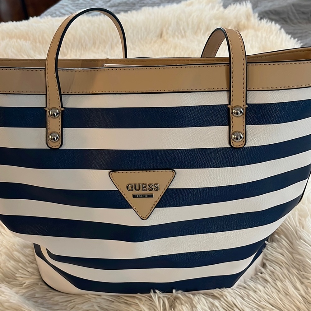 Guess blue and white shoulder bag with tan trim like new with no scuffs or marks